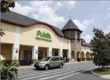  ??  ?? In this May 19, 2013 file photo, a vehicle passes the front of the Publix supermarke­t in Zephyrhill­s, Fla. AP PHOTO/SCOTT ISKOWITZ