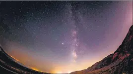  ?? AFP/FILE ?? The Milky Way galaxy rising in the sky between Palestinia­n Jericho and Israel's Ein Gedi.