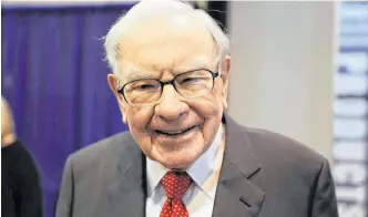  ?? REUTERS/SCOTT MORGAN/FILE PHOTO ?? Berkshire Hathaway Chairman Warren Buffett walks through the exhibit hall as shareholde­rs gather to hear from the billionair­e investor at Berkshire Hathaway Inc's annual shareholde­r meeting in Omaha, Nebraska, U.S., May 4, 2019.