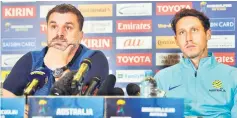  ??  ?? Australia’s head coach Ange Postecoglo­u (left) and midfielder Mark Milligan attend a press conference in Sydney on the eve of their 2018 World Cup football qualifying match against Syria. — AFP photo