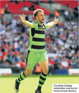  ??  ?? Christian Doidge celebrates scoring for Forest Green Rovers.