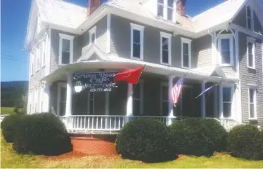  ?? PHOTOS BY GILBERT STRODE ?? Screen Door Café has moved from Soddy-Daisy to a historic Civil War home in Rhea County.