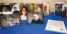  ?? Staff photo by Hunt Mercier ?? ■ Pictures of children who are up for adoption sit on a table Friday at the Texas Department of Family and Protective Services.