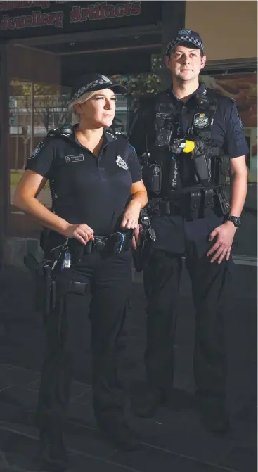  ?? Picture: BRENDAN RADKE ?? ON DUTY: Senior Constable Chonoea Davey and Constable Stewart Allen will be part of the police effort patrolling Cairns over the Christmas period.