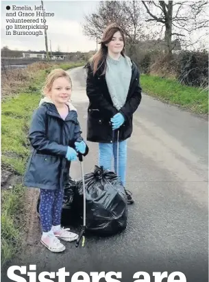  ??  ?? Emelia, left, and Grace Hulme volunteere­d to go litterpick­ing in Burscough