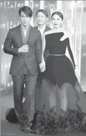  ?? Kevin Lee
Getty Images ?? ATTENDING the festival’s opening night are Wu Chen, left, Leon Lai and Fan Bingbing.