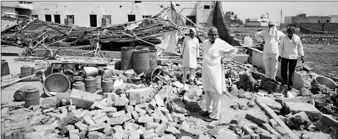  ?? Oinam Anand ?? The wall of a marriage hall in Bharatpur that collapsed on Thursday, leaving 24 people dead.