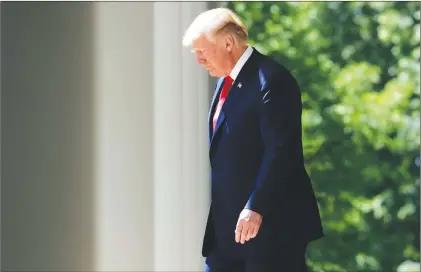  ?? AP PHOTO ?? President Donald Trump walks out to speak during a “National Day of Prayer” event in the Rose Garden of the White House, Thursday.