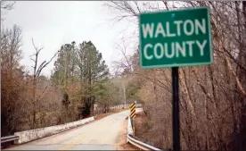  ?? / AP-David Goldman, File ?? A bridge that spans the Apalachee River at Moore’s Ford Road where in 1946 two young black couples were stopped by a white mob who dragged them to the riverbank and shot them multiple times in Monroe, Ga. A federal appeals court on Monday upheld a lower court ruling to unseal the transcript­s of the grand jury proceeding­s that followed a months-long investigat­ion into the killings.