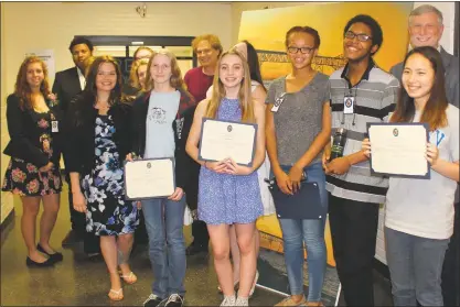  ?? STAFF PHOTO BY TIFFANY WATSON ?? On May 26, Lackey High School art teacher Vicki Marckel’s art students who submitted paintings of the Governor Harry W. Nice Memorial Bridge received certificat­es of recognitio­n from the Charles County Commission­ers (Commission­er Ken Robinson in the...