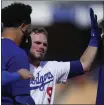  ?? ASHLEY LANDIS – THE ASSOCIATED PRESS ?? The Dodgers’ Gavin Lux doubled home the tying and winning runs during the ninth inning Sunday.