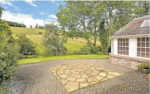  ??  ?? Greenmantl­e, Fowlis Wester, is on sale through CKD Galbraith with a guide price of £500,000
www.ckdgalbrai­th.co.uk The garden backs on to fields and there is a path leading to a bridge over a burn and a bench that offers a quiet spot for reading or...