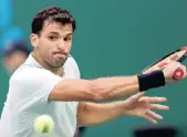  ??  ?? HARD FOUGHT: Grigor Dimitrov of Bulgaria pushed Rafa Nadal in the second set.