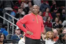  ?? ?? Atlanta Hawks head coach Nate McMillan looks on from the bench during the first half of an NBA basketball game Feb. 9 against the Phoenix Suns, in Atlanta. (AP Photo/John Bazemore)