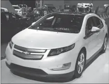  ??  ?? A transparen­t Chevy Volt reveals the internal workings of this electric car with its built-in memory system that will even periodical­ly run the gas engine to keep its internal components lubricated.