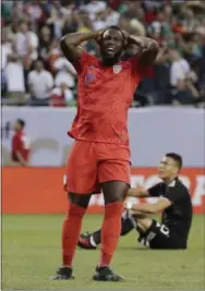  ?? NAM Y. HUH — THE ASSOCIATED PRESS ?? Jozy Altidore reacts after missing a shot against Mexico during the first half on July 7. The United States lost, 2-1, in the finals of the Gold Cup.