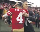  ?? NHAT V. MEYER — BAY AREA NEWS GROUP ?? San Francisco 49ers general manager John Lynch hugs San Francisco 49ers starting quarterbac­k Nick Mullens (4) following their win against the Denver Broncos at Levi’s Stadium in Santa Clara on Dec. 9, 2018.