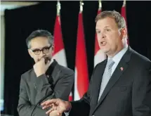  ?? Fred Chartrand/the Canadian Press ?? Foreign Affairs Minister John Baird, right, here with Indonesian Foreign Affairs Minister Raden Mohammad Marty Muliana Natalegawa, says there is no simple answer to resolving the Syrian conflict.