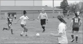  ?? MARK HUMPHREY ENTERPRISE-LEADER ?? Lincoln freshman Kyli Jenkins works to control the ball on the offensive end of the field. The Lady Wolves hosted Berryville in a soccer match April 5 and lost 2-0.