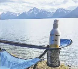  ?? William Carle ?? The Revelshine White, which critic Esther Mobley consumed while sitting by Jackson Lake in Grand Teton National Park in Wyoming.