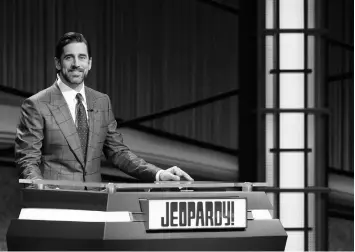  ?? JEOPARDY PRODUCTION­S INC. ?? Football star Aaron Rodgers stands at the lectern during his time as a guest host on “Jeopardy!”