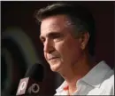  ?? The Associated Press ?? GRUDEN DISMISSED: Washington Redskins president Bruce Allen listens to a question from the media at Monday’s news conference in Ashburn, Va.