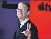  ?? ANGELA WEISS AFP via Getty Images ?? UNLIKE Apple CEO Tim Cook, Nadella has focused on engineerin­g a corporate revival.