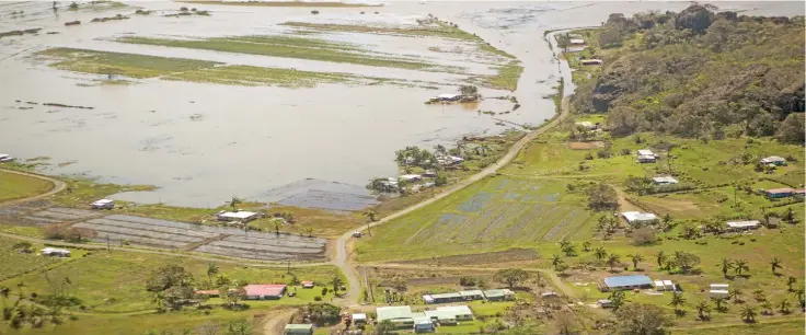  ?? Leon Lord ?? Farm fields in Vanua Levu submerged in water following Tropical Cyclone Yasa. Photo: