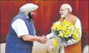  ?? HT PHOTO ?? Punjab chief minister Amarinder Singh with PM Narendra Modi in New Delhi on Wednesday.