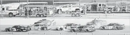  ?? PHELAN M. EBENHACK THE ASSOCIATED PRESS ?? Kyle Larson (42) and Jimmie Johnson (48) begin a multi-car accident on the final lap of the NASCAR Clash auto race Sunday at Daytona.