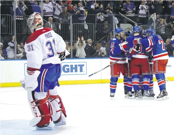 ?? — GETTY IMAGES FILES ?? Mats Zuccarello of the New York Rangers celebrates with teammates after scoring his second goal against Carey Price during the second period in Game Six Saturday night. With the Habs out of the playoffs, management faces some hard decisions.