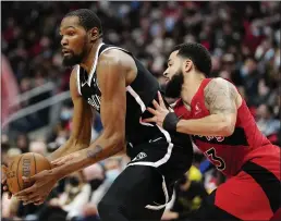  ?? FRANK GUNN — THE CANADIAN PRESS ?? Brooklyn Nets forward Kevin Durant (7) looks to move the ball as Toronto Raptors guard Fred VanVleet (23) defends during the second half Sunday in Toronto.