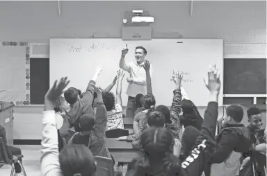  ?? PHOTOS BY BRANDON DAHLBERG/FOR THE COMMERCIAL APPEAL ?? Dylan Thompson asks students questions during A Diamond in the Rough meeting at Dexter Elementary on Thursday.