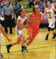  ?? AUSTIN HERTZOG — DIGITAL FIRST MEDIA ?? Boyertown’s Kylie Webb (13) drives to the basket as Perkiomen Valley’s Alex Blomstrom defends during the second quarter of a game last season.