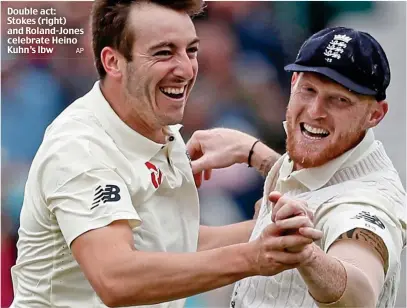  ?? AP ?? Double act: Stokes (right) and Roland-Jones celebrate Heino Kuhn’s lbw