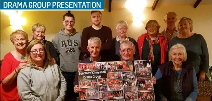  ??  ?? Rory Kinsella from Bunclody-Kilmyshall Drama Group was joined by fellow members to present Joe Redmond of Redmond’s Pub with a 20th birthday celebratio­n photo montage of the group. Redmond’s have proudly displayed the trophies and awards won by the group for many years.