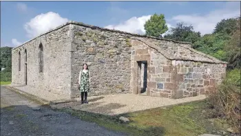  ??  ?? Tessa outside the restored Clachan Church.