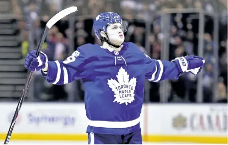  ?? FRANK GUNN/THE CANADIAN PRESS ?? Toronto Maple Leafs’ centre William Nylander celebrates his game-winning overtime goal against the New Jersey Devils, in Toronto on Thursday. The Leafs won 1-0.