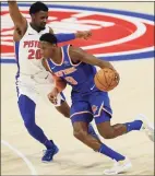  ?? Duane Burleson / Associated Press ?? Knicks guard RJ Barrett (9) drives against Pistons guard Josh Jackson (20) on Sunday. The Knicks have several lottery picks on the roster, although none yet deserving of a “can’t-miss” label; Barrett has shown the most promise.