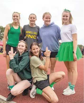  ?? ?? Grace Susa, Maecy Wade, Piper Albert, Poppy Susa, (front, from left) Hannah Green and Ruby Price after participat­ing in the U16s girls high jump.