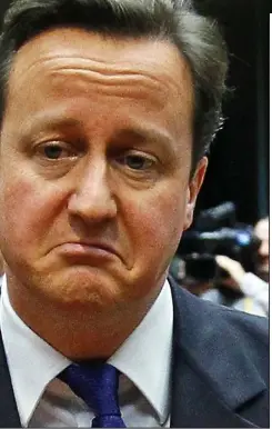  ??  ?? Down in the mouth: David Cameron at an EU summit
