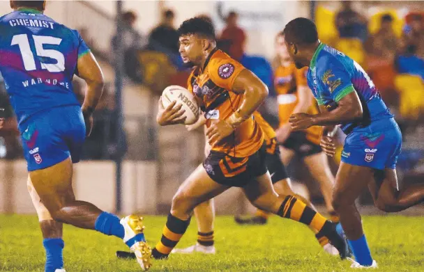  ?? Picture: Brendan Radke ?? Tully's Ponepate Tongia makes a line break in the FNQRL A-grade match against Innisfail Leprechaun­s at Callendar Park, Innisfail.