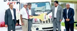  ?? ?? Mahindra & Mahindra Ltd. of India and Ideal Motors in Sri Lanka hand over the first new Bolero City Pik-Up, the first single cab pick-up to be assembled in Sri Lanka, to Suren Cooke – Director, Suren Cooke Agencies, at the Waters Edge Battaramul­la on Thursday. From left: Sachin Arolkar, Head of Internatio­nal Operations, Automotive Division, Mahindra & Mahindra Limited, Suren CookeDirec­tor, Suren Cooke Agencies, Veejay Nakra, CEO, Automotive Division, M&M Ltd, Nalin Welgama, Founder & Chairman, Ideal Motors and Aravinda de Silva, Deputy Chairman of the Ideal Group