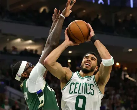  ?? Stacy Revere/Getty Images ?? Jayson Tatum comes off a 46-point game in Boston’s Game 6 win Friday against Milwaukee.