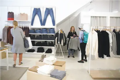  ?? Photos by Liz Hafalia / The Chronicle ?? Everlane, an online retail startup, opened a