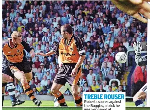  ?? ?? TREBLE ROUSER Roberts scores against the Baggies, a trick he was very good at