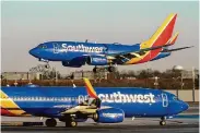  ?? Kiichiro Sato/Associated Press 2023 ?? Southwest Airlines is dealing with weak financial results from its first quarter and with delays in getting new planes from Boeing.