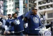  ?? PATRICK SEMANSKY - THE ASSOCIATED PRESS ?? Villanova head coach Jay Wright, right, gestures as fans chant during a rally celebratin­g his team’s NCAA college basketball championsh­ip, Thursday, in Philadelph­ia. Villanova defeated Michigan on Monday for the NCAA men’s basketball title.