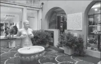  ??  ?? A modern replica of Treviso’s famous Fontana Delle Tette stands in a small courtyard tucked away in a shopping arcade in Treviso, Italy. The original fountain, built in the 16th century, dispensed wine on special days.