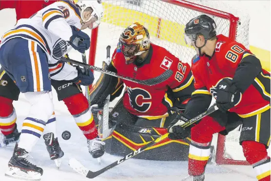  ?? JIM WELLS ?? The demotion of goaltender Tyler Parsons, who has impressed during the pre-season, was among the Flames roster moves that generated the most chatter on Wednesday.